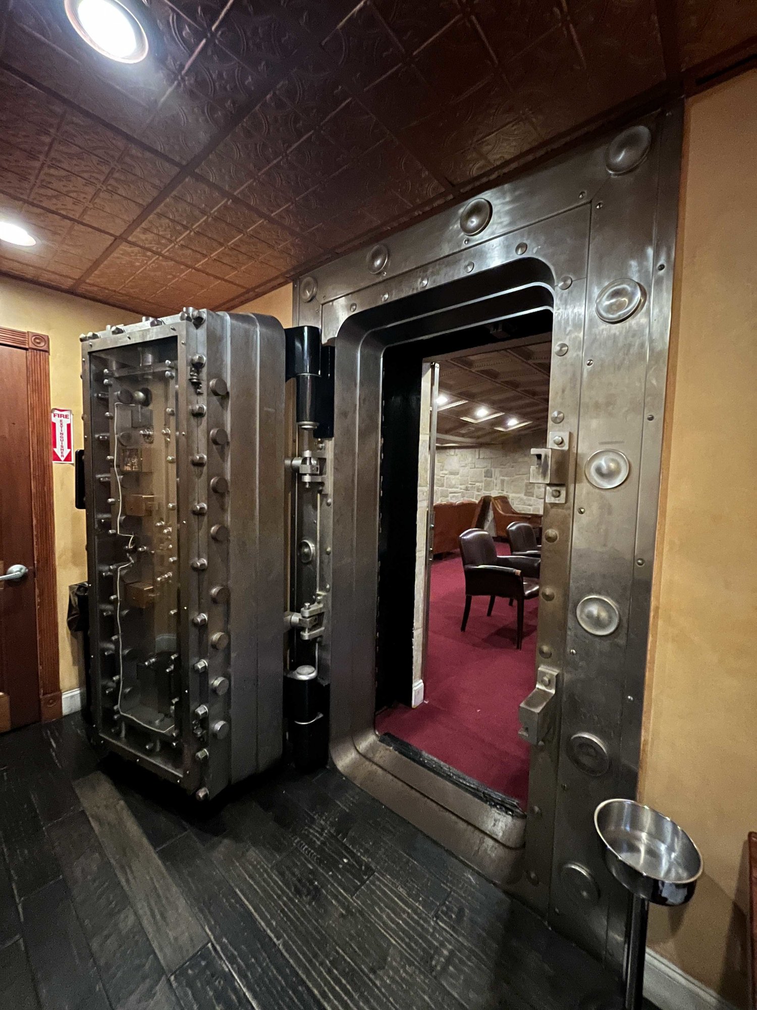 large metal locking cellar entrance door